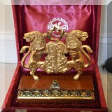 D26. Brass menorah.